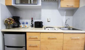 Day use room with kitchen at Suites Coben.