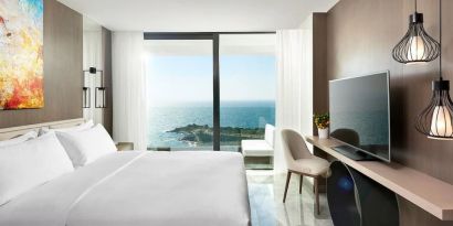 Day use room with ocean view at Le Méridien Bodrum Beach Resort.