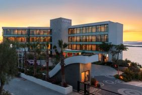 Hotel exterior at sunset at Le Méridien Bodrum Beach Resort.