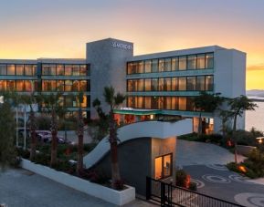 Hotel exterior at sunset at Le Méridien Bodrum Beach Resort.