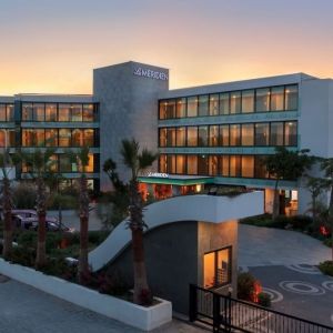 Hotel exterior at sunset at Le Méridien Bodrum Beach Resort.