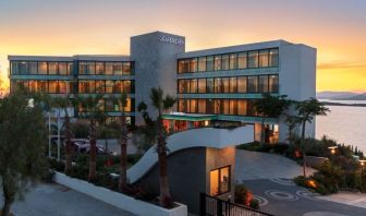 Hotel exterior at sunset at Le Méridien Bodrum Beach Resort.