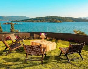 Seating area with sea view at Le Méridien Bodrum Beach Resort.