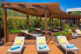 Pool loungers and day beds at Le Méridien Bodrum Beach Resort.