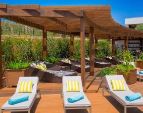 Pool loungers and day beds at Le Méridien Bodrum Beach Resort.