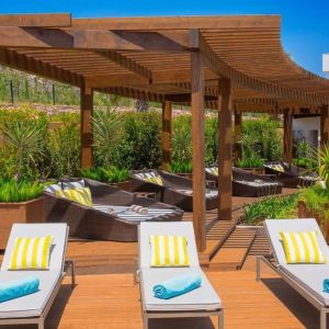 Pool loungers and day beds at Le Méridien Bodrum Beach Resort.