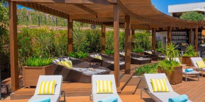 Pool loungers and day beds at Le Méridien Bodrum Beach Resort.