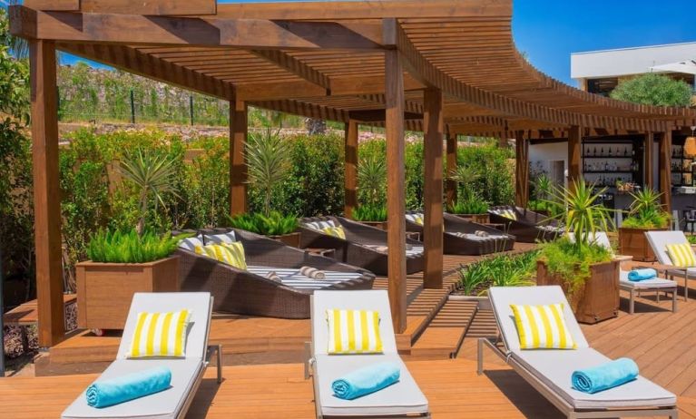 Pool loungers and day beds at Le Méridien Bodrum Beach Resort.