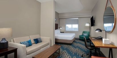 Spacious king room with lounge area at Four Points By Sheraton Fort Lauderdale Airport - Dania Beach.