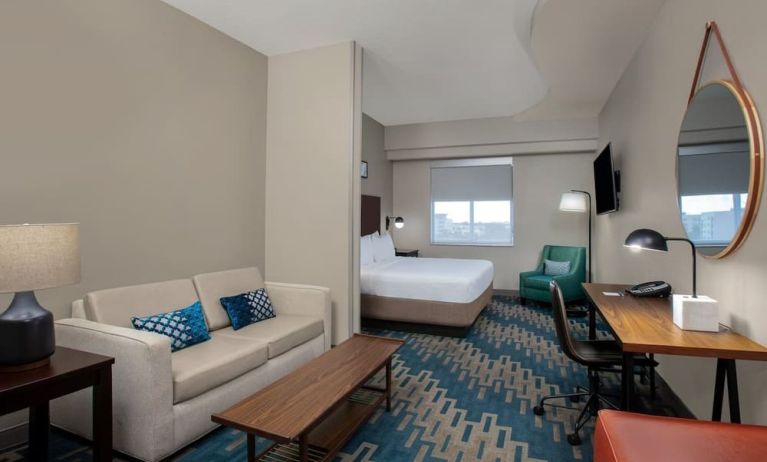 Spacious king room with lounge area at Four Points By Sheraton Fort Lauderdale Airport - Dania Beach.