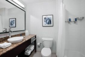 Guest bathroom with shower at Four Points By Sheraton Fort Lauderdale Airport - Dania Beach.