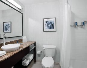 Guest bathroom with shower at Four Points By Sheraton Fort Lauderdale Airport - Dania Beach.