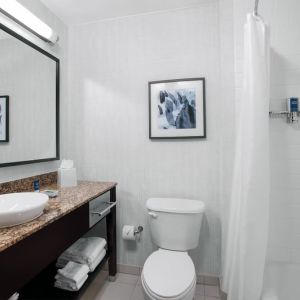 Guest bathroom with shower at Four Points By Sheraton Fort Lauderdale Airport - Dania Beach.