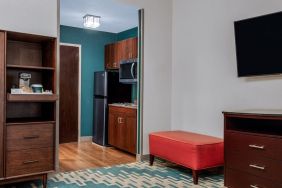 Day use room with TV and kitchen area at Four Points By Sheraton Fort Lauderdale Airport - Dania Beach.