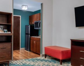 Day use room with TV and kitchen area at Four Points By Sheraton Fort Lauderdale Airport - Dania Beach.