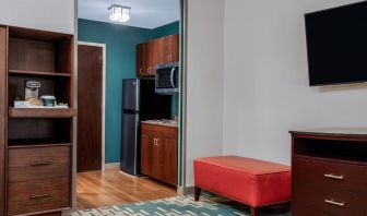 Day use room with TV and kitchen area at Four Points By Sheraton Fort Lauderdale Airport - Dania Beach.