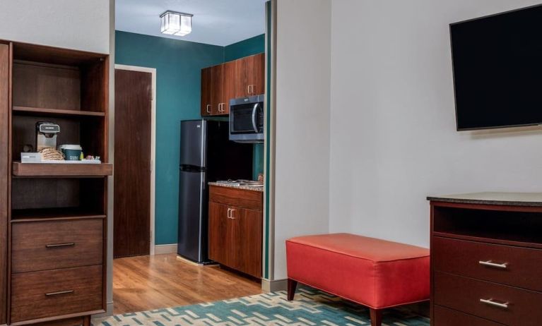 Day use room with TV and kitchen area at Four Points By Sheraton Fort Lauderdale Airport - Dania Beach.