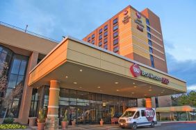 Hotel exterior and parking at Best Western Plus Hotel & Conference Center.