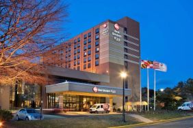 Hotel exterior at night at Best Western Plus Hotel & Conference Center.