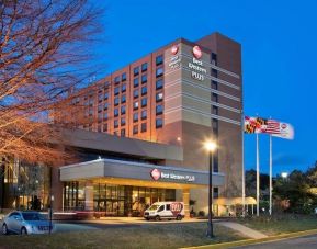 Hotel exterior at night at Best Western Plus Hotel & Conference Center.