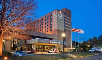 Hotel exterior at night at Best Western Plus Hotel & Conference Center.