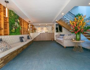 Lobby and lounge area at Montes De La Castellana Hotel.