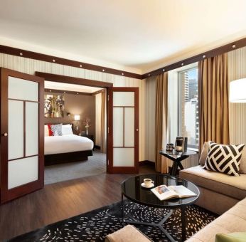 Spacious king suite with lounge area at Sofitel Philadelphia At Rittenhouse Square.