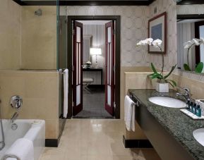 Guest bathroom with shower and bath at Sofitel Philadelphia At Rittenhouse Square.