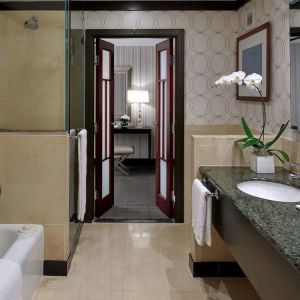 Guest bathroom with shower and bath at Sofitel Philadelphia At Rittenhouse Square.