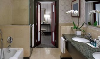 Guest bathroom with shower and bath at Sofitel Philadelphia At Rittenhouse Square.