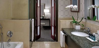 Guest bathroom with shower and bath at Sofitel Philadelphia At Rittenhouse Square.