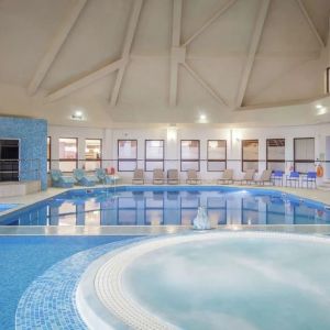 Indoor pool and hot tub at DoubleTree By Hilton Glasgow Westerwood.