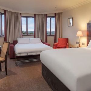 Day use room with TV and extra bed at DoubleTree By Hilton Glasgow Westerwood.