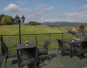 Outdoor terrace overlooking golf course at DoubleTree By Hilton Glasgow Westerwood.