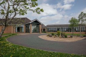 Hotel entrance and parking at DoubleTree By Hilton Glasgow Westerwood.