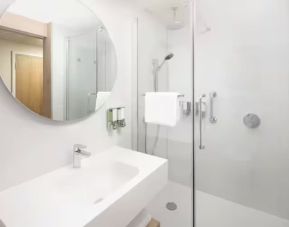 Guest bathroom with shower at Hampton By Hilton London Old Street.