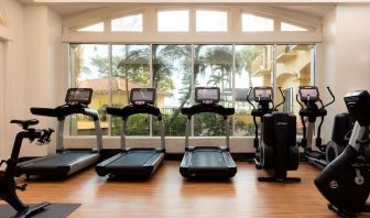 Fitness center available at Embassy Suites By Hilton Deerfield Beach Resort & Spa.