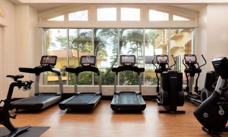 Fitness center available at Embassy Suites By Hilton Deerfield Beach Resort & Spa.