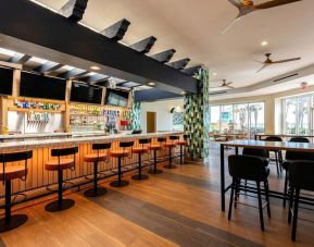 Hotel bar at Embassy Suites By Hilton Deerfield Beach Resort & Spa.