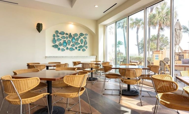 Dining and coworking space at Embassy Suites By Hilton Deerfield Beach Resort & Spa.