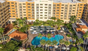 Hotel with large outdoor pool at Embassy Suites By Hilton Deerfield Beach Resort & Spa.