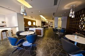 Lounge and coworking area at Prima Vera Hotel.