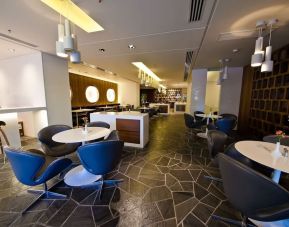 Lounge and coworking area at Prima Vera Hotel.