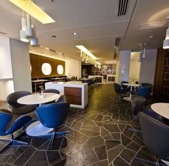 Lounge and coworking area at Prima Vera Hotel.