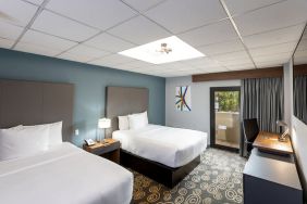 Double queen beds at Regency Miami Airport By Sonesta.