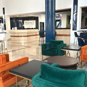 Lobby and lounge at Regency Miami Airport By Sonesta.