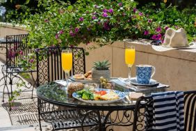 Breakfast available on outdoor terrace at Prima Royale Hotel.