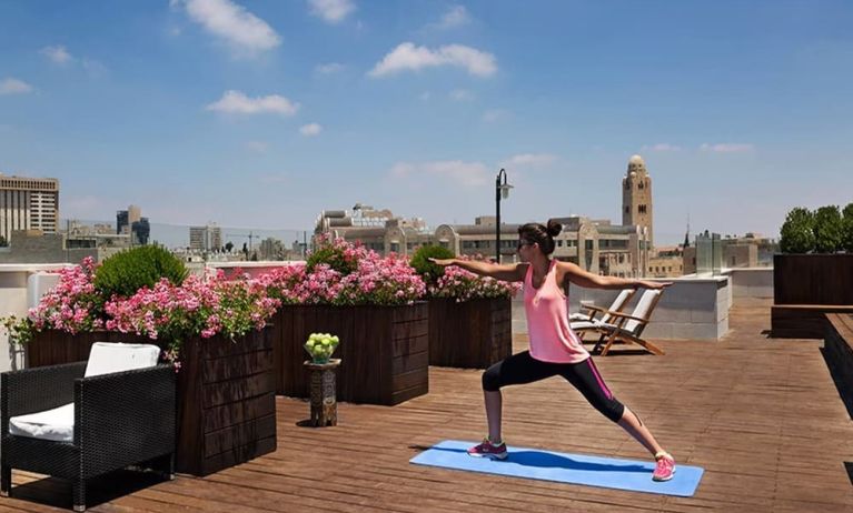 Yoga on the roof at Prima Royale Hotel.