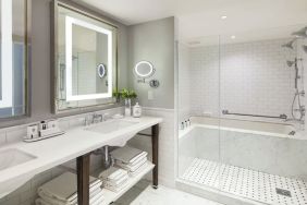 Guest bathroom with shower at InterContinental New York Barclay.