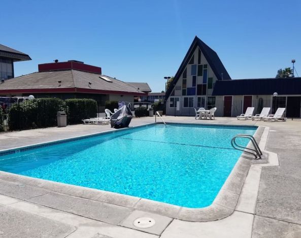 Outdoor pool at Economy Inn, Fresno.